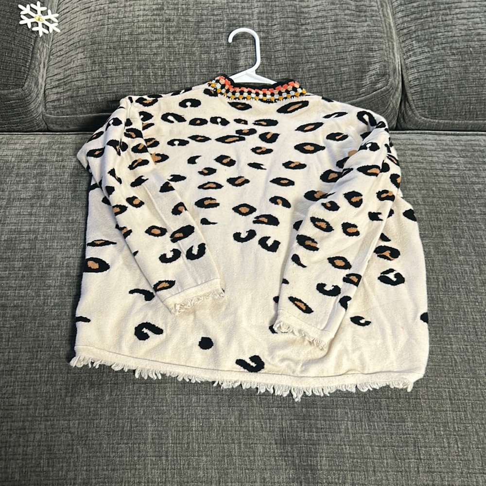 Boutique size medium, super fun, unique color I’m all about it